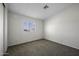 This bedroom has neutral paint and carpet at 53925 W Stallion Rd, Maricopa, AZ 85139