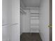 Walk in closet featuring multiple shelves and ample storage space at 53925 W Stallion Rd, Maricopa, AZ 85139