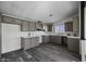 Modern kitchen features updated appliances, ample cabinet space, and stylish countertops at 53925 W Stallion Rd, Maricopa, AZ 85139