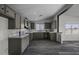 Modern kitchen features updated appliances, ample cabinet space, and stylish countertops at 53925 W Stallion Rd, Maricopa, AZ 85139