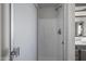Shower stall with sleek, modern fixtures and a partial view of the bathroom vanity at 53925 W Stallion Rd, Maricopa, AZ 85139