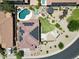 Aerial view of the property showcasing the pool, backyard, and solar panels at 6712 W Miner Trl, Peoria, AZ 85383