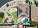 Aerial view of the property showcasing the pool, backyard, and solar panels at 6712 W Miner Trl, Peoria, AZ 85383