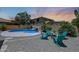 Backyard with pool, patio, fire pit, and lounge area at 6712 W Miner Trl, Peoria, AZ 85383