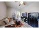 This room has an accent rug, furniture, and an open doorway at 6712 W Miner Trl, Peoria, AZ 85383