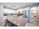 Bright kitchen with stainless steel appliances and a large island, perfect for modern living at 6712 W Miner Trl, Peoria, AZ 85383