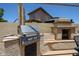 Outdoor built-in grill and brick fireplace perfect for entertaining friends and Gathering at 6712 W Miner Trl, Peoria, AZ 85383