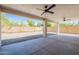 Large covered patio overlooking the gravel backyard providing an entertainment space at 6719 S Hardy Dr, Tempe, AZ 85283