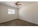 Bedroom with window and tile flooring at 6719 S Hardy Dr, Tempe, AZ 85283