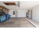 Spacious garage with ample storage and potential workspace, perfect for projects at 6719 S Hardy Dr, Tempe, AZ 85283