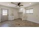 Bright laundry room featuring wood-look tile flooring and modern fixtures and cabinetry at 6719 S Hardy Dr, Tempe, AZ 85283