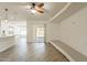 Open-concept room boasts a sliding door to the backyard and a convenient seating nook at 6719 S Hardy Dr, Tempe, AZ 85283