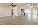 Open-concept living room seamlessly connecting to kitchen and dining areas, perfect for modern living at 6719 S Hardy Dr, Tempe, AZ 85283