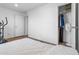 Bedroom featuring a walk-in closet and an exercise machine near a door at 701 S Dobson Rd # 203, Mesa, AZ 85202