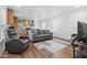 Inviting living room and kitchen with hardwood floors and plenty of natural light at 701 S Dobson Rd # 203, Mesa, AZ 85202