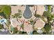 An overhead view displays a well-maintained home, circular driveway, and lush surroundings in a quiet neighborhood at 7032 N 2Nd Ave, Phoenix, AZ 85021
