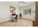 Well-lit bedroom with tile flooring, large window and an open floor plan with modern fixtures at 7032 N 2Nd Ave, Phoenix, AZ 85021