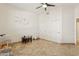 Well-lit bedroom featuring tile flooring and a large storage closet with an open floor plan at 7032 N 2Nd Ave, Phoenix, AZ 85021