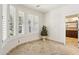Bright bonus room with large windows, plantation shutters, and tiled flooring at 7032 N 2Nd Ave, Phoenix, AZ 85021