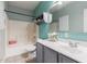 Bathroom featuring shower-tub combo, sink with storage and tiled flooring at 716 E Horizon Heights Dr, San Tan Valley, AZ 85143