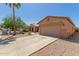 Charming single-story home with a two-car garage and low-maintenance desert landscaping at 716 E Horizon Heights Dr, San Tan Valley, AZ 85143