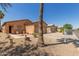 Inviting single-story home with a desert-landscaped front yard and a cozy entryway at 716 E Horizon Heights Dr, San Tan Valley, AZ 85143