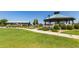 Community gazebo surrounded by lush greenery and walking paths at 716 E Horizon Heights Dr, San Tan Valley, AZ 85143