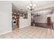 Open concept living space features tile flooring, hardwood flooring, and natural lighting at 716 E Horizon Heights Dr, San Tan Valley, AZ 85143