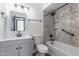 Updated bathroom featuring modern fixtures, a shower with marble style tile, and vanity sink at 8602 N 42Nd Dr, Phoenix, AZ 85051