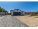 Charming single-story home with well-maintained lawn, desert landscaping, and extra long driveway at 8602 N 42Nd Dr, Phoenix, AZ 85051