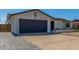 Charming single-story home with well-maintained lawn, desert landscaping, and attached two car garage at 8602 N 42Nd Dr, Phoenix, AZ 85051