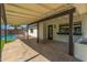 Covered patio with access to pool, offering shade and outdoor entertaining space at 8602 N 42Nd Dr, Phoenix, AZ 85051