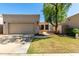 Charming single Gathering home featuring a two-car garage and manicured lawn at 8725 E Vía Del Arbor --, Scottsdale, AZ 85258