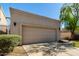 Charming home with a two-car garage and desert landscaping creates great curb appeal at 8725 E Vía Del Arbor --, Scottsdale, AZ 85258