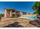 Expansive backyard with private pool, patio area, and mature landscaping at 8939 W Villa Rita Dr, Peoria, AZ 85382