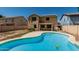 Backyard showcasing the private pool and the home's exterior, including a covered patio at 8939 W Villa Rita Dr, Peoria, AZ 85382