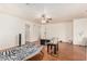 Spacious bedroom with wood-look flooring and plenty of natural light at 8939 W Villa Rita Dr, Peoria, AZ 85382