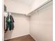A simple reach-in closet with a single shelf and hanging rack in a bedroom at 8939 W Villa Rita Dr, Peoria, AZ 85382