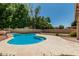 Inviting backyard pool with concrete surround, perfect for outdoor relaxation and entertaining at 8939 W Villa Rita Dr, Peoria, AZ 85382