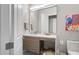 Contemporary bathroom with a modern vanity, large mirror, and an enclosed glass shower at 9255 W Los Gatos Dr, Peoria, AZ 85383