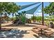 Community playground featuring climbing structures, slides, and shaded picnic area for outdoor Gathering fun at 9255 W Los Gatos Dr, Peoria, AZ 85383