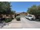 Charming single-story home with desert landscaping, two-car garage, and solar panels at 10414 W Windsor Ave, Avondale, AZ 85392