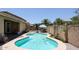 Backyard with a sparkling pool, surrounded by brick paving, perfect for relaxation and outdoor fun at 10414 W Windsor Ave, Avondale, AZ 85392