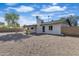 This backyard features a low-maintenance landscape, perfect for outdoor entertaining and relaxation at 1119 W Ellis Dr, Tempe, AZ 85282