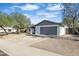 A well-maintained single-Gathering home with gray roof, gray garage door and low-maintenance landscaping at 1119 W Ellis Dr, Tempe, AZ 85282