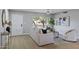 Bright living room featuring a large window, white sofa, and a modern interior design at 1119 W Ellis Dr, Tempe, AZ 85282