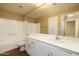 Clean and bright bathroom with white cabinets and tub with shower at 11375 E Sahuaro Dr # 1055, Scottsdale, AZ 85259