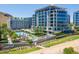 Gorgeous aerial view showcasing the community pool and lush landscaping around the building at 120 E Rio Salado Pkwy # 101, Tempe, AZ 85281