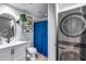 Bathroom featuring a stacked washer and dryer and a shower with curtain at 120 E Rio Salado Pkwy # 101, Tempe, AZ 85281