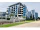 Stunning high-rise building with glass balconies offers modern city living at its finest at 120 E Rio Salado Pkwy # 101, Tempe, AZ 85281